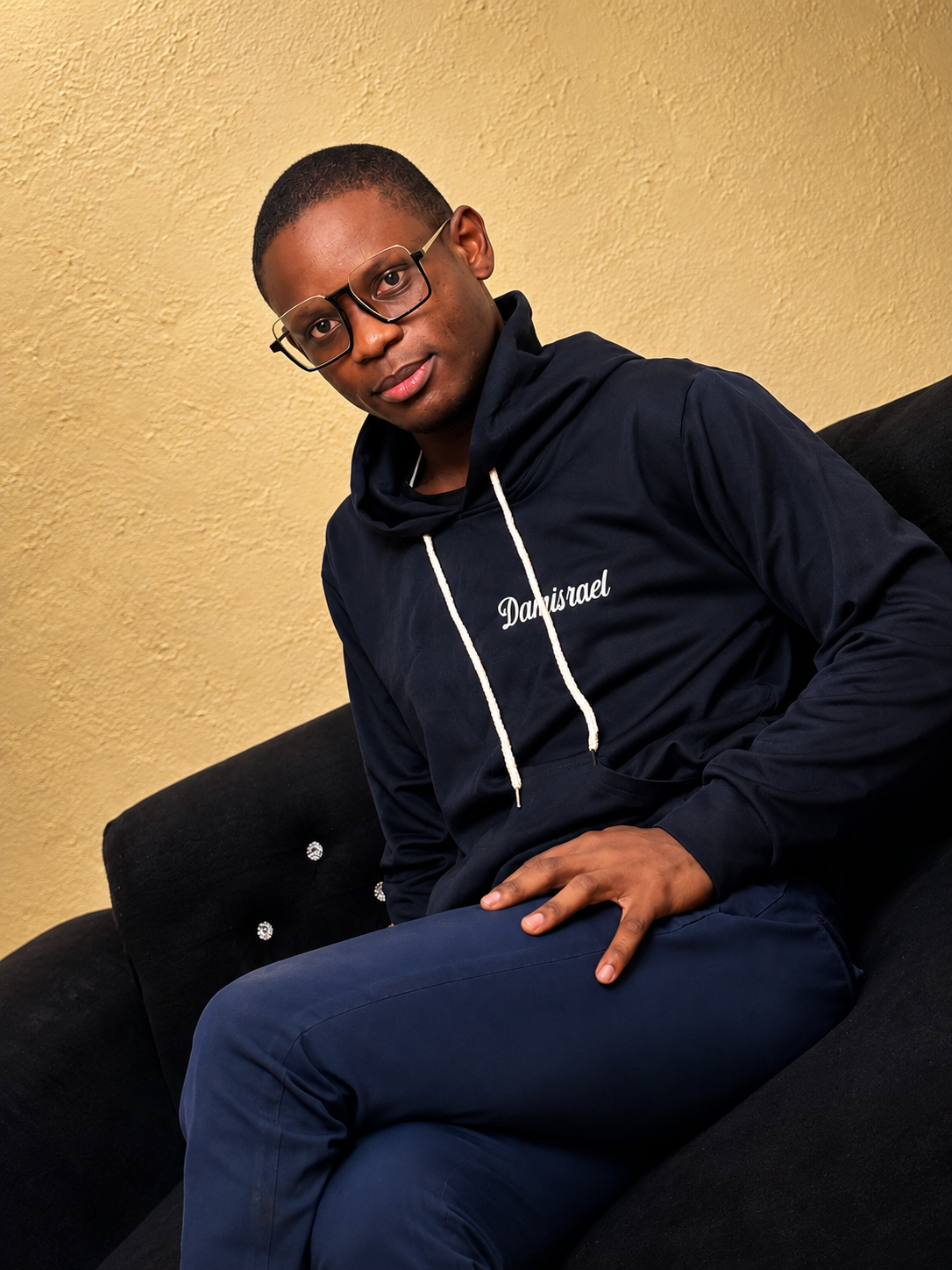 Oluwadamilare Israel in a hoodie